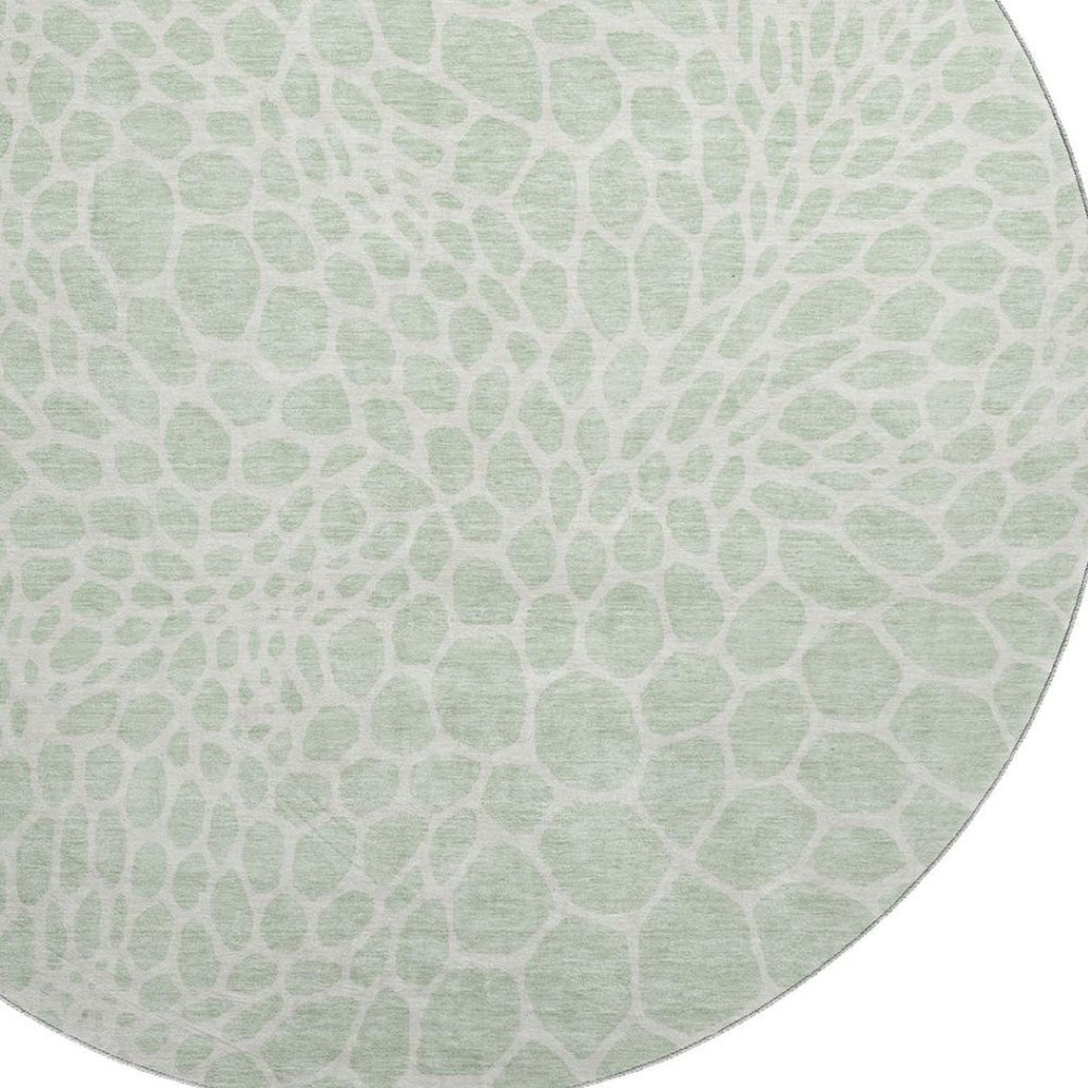 HomeRoots 8' Mint Green & Ivory Geometric Round Rug - Washable, UV-Protected, Stylish for Any Space! 673070