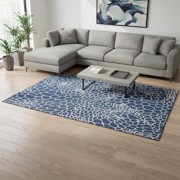 HomeRoots 8' X 10' Navy Blue & Ivory Geometric Area Rug – Washable, UV Protected, Ideal for High-Traffic Spaces 673077