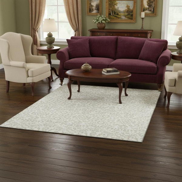 HomeRoots 5' X 8' Ivory and Beige Damask Area Rug - Washable, Stain-Resistant, UV Protected for Your Home 673135