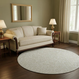HomeRoots 8' Ivory and Beige Damask Round Rug - Washable, UV Protected, Stain-Resistant for Busy Homes 673136