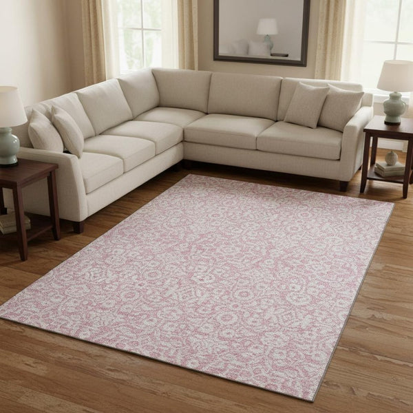 HomeRoots 8' X 10' Elegant Pink and Ivory Damask Washable Area Rug with UV Protection for Family Spaces 673161