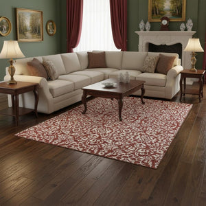 HomeRoots 9' X 12' Red And Ivory Damask Area Rug - Washable, UV Protected, Durable for High-Traffic Spaces 673168