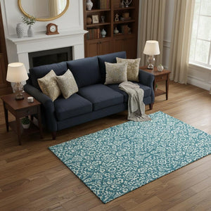 HomeRoots 5' X 8' Teal and Ivory Damask Area Rug - Washable, Stain-Resistant, UV Protected for Everyday Use 673177