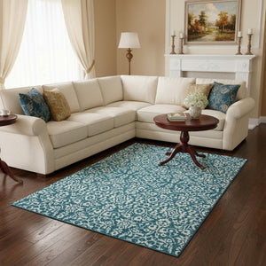 HomeRoots 8' X 10' Elegant Teal and Ivory Damask Area Rug - Washable, UV-Protected, Durable for High-Traffic Spaces 673179