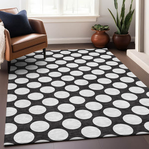 HomeRoots 5' X 8' Black And White Polka Dot Area Rug - Durable, Washable, UV Protected for Stylish Spaces 673185