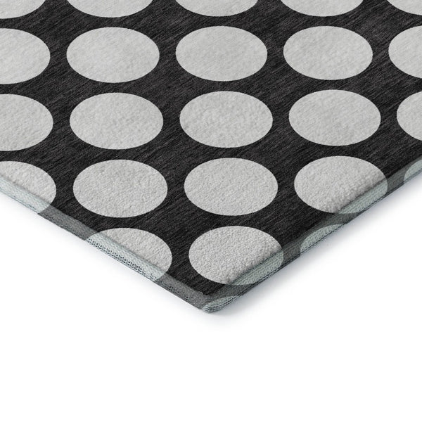 HomeRoots 5' X 8' Black And White Polka Dot Area Rug - Durable, Washable, UV Protected for Stylish Spaces 673185