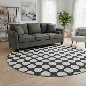 HomeRoots 8' Bold Black and White Polka Dot Round Rug - Washable, UV Protected, Durable for High-Traffic Areas 673186