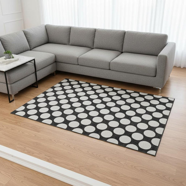 HomeRoots 8' X 10' Black And White Polka Dot Washable Area Rug - Stylish, Durable & UV-Resistant for Homes! 673187