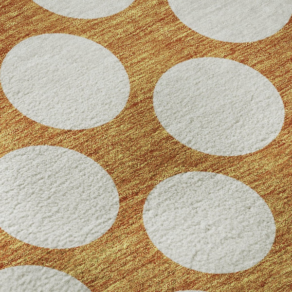 HomeRoots 8' Vibrant Orange and Ivory Polka Dot Washable Round Rug with UV Protection for High-Traffic Areas 673240