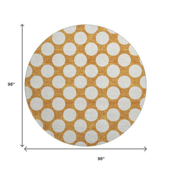 HomeRoots 8' Vibrant Orange and Ivory Polka Dot Washable Round Rug with UV Protection for High-Traffic Areas 673240