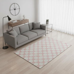 HomeRoots 5' X 8' Cheerful Pink & Ivory Polka Dot Washable Area Rug with UV Protection for Easy Care & Style 673245