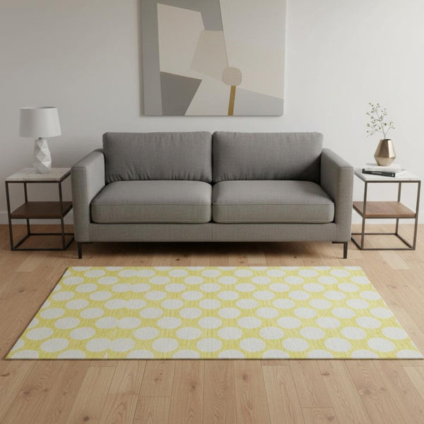 HomeRoots 5' X 8' Yellow and Ivory Polka Dot Area Rug - UV Protected, Washable, Kid & Pet Friendly Design! 673263