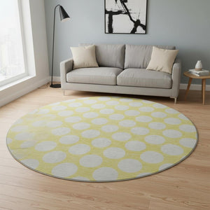 HomeRoots 8' Yellow Polka Dot Round Rug - Washable, UV Resistant, Soft, and Durable for Playrooms & Patios 673264