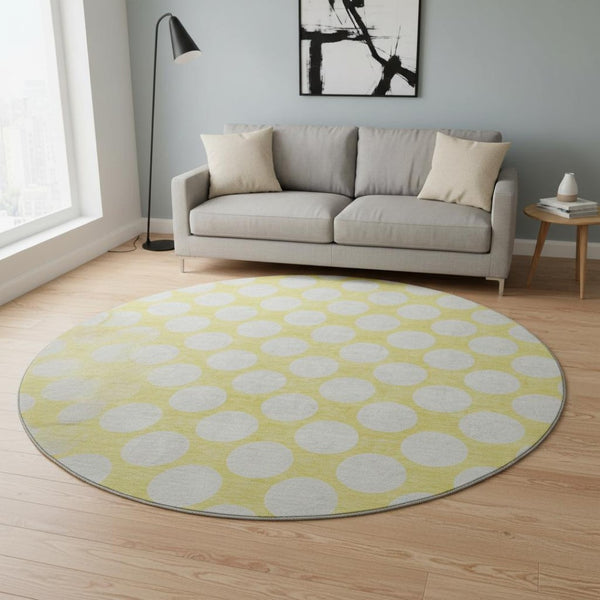 HomeRoots 8' Yellow Polka Dot Round Rug - Washable, UV Resistant, Soft, and Durable for Playrooms & Patios 673264