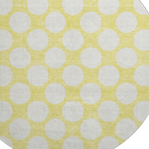 HomeRoots 8' Yellow Polka Dot Round Rug - Washable, UV Resistant, Soft, and Durable for Playrooms & Patios 673264