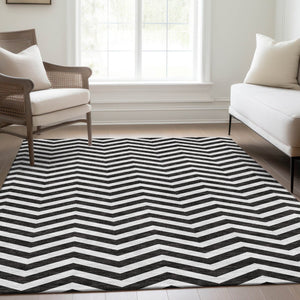 HomeRoots 5' X 8' Stylish Black and Ivory Chevron Washable Area Rug - Durable, UV-Protected, Pet-Friendly Design 673275