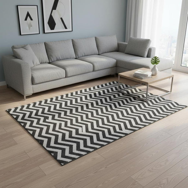 HomeRoots 8' X 10' Black and Ivory Chevron Area Rug - Stylish, Washable, UV-Protected, Pet-Friendly Design 673277