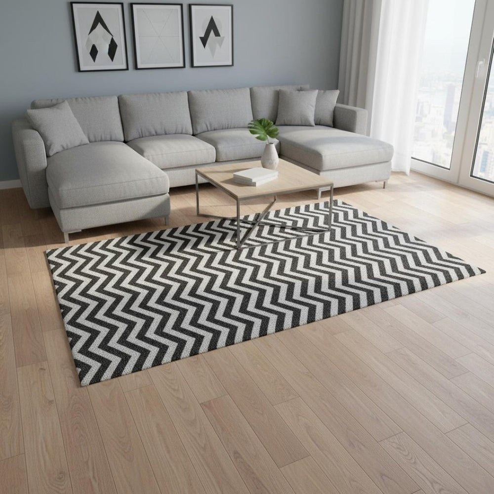 HomeRoots 9' X 12' Stylish Black and Ivory Chevron Washable Area Rug with UV Protection for Busy Homes 673278