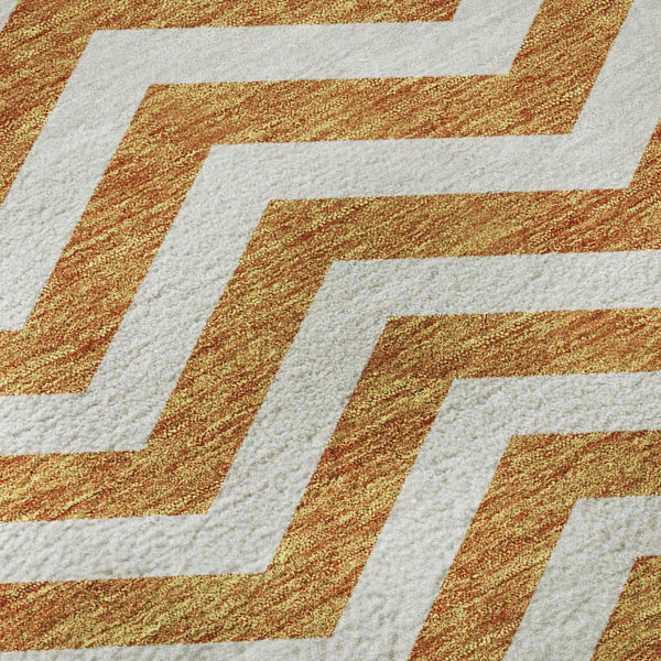 HomeRoots 8' Orange And Ivory Chevron Round Rug - Durable, Washable, UV-Protected, Perfect for Any Space 673312