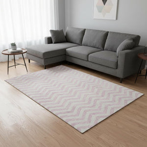 HomeRoots 9' X 12' Pink And Ivory Chevron Area Rug - Washable, UV Protected, Modern Style for Any Room 673320