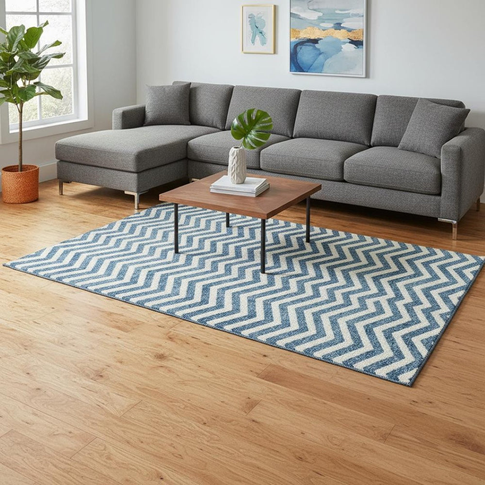 HomeRoots 8' X 10' Teal And Ivory Chevron Area Rug - Washable, UV-Protected, Stylish & Durable for High-Traffic Spaces 673337