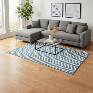 HomeRoots 9' X 12' Teal And Ivory Chevron Washable Area Rug - Durable, Stain-Resistant, UV Protected Design! 673338