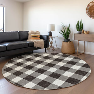 HomeRoots 8' Black And Ivory Plaid Washable Round Rug with UV Protection - Durable, Stylish, and Easy Care! 673354