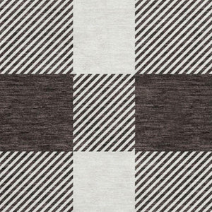 HomeRoots 8' Black And Ivory Plaid Washable Round Rug with UV Protection - Durable, Stylish, and Easy Care! 673354