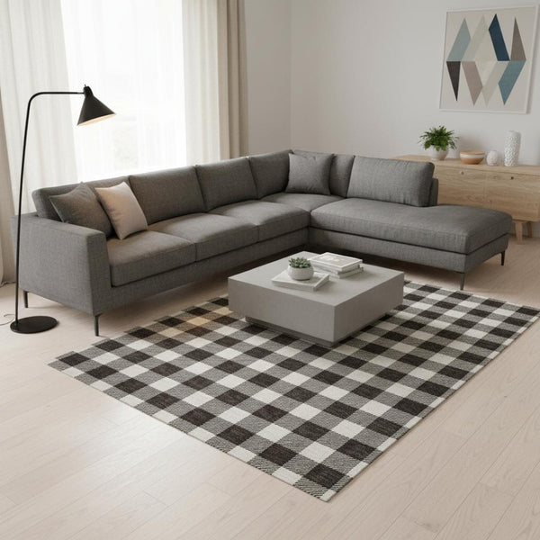 HomeRoots 8' X 10' Black And Ivory Plaid Washable Area Rug - Stylish, Durable, UV Protected for High-Traffic Spaces 673355