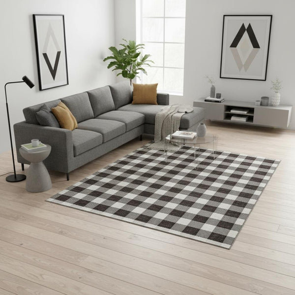 HomeRoots 10' X 14' Black And Ivory Plaid Washable Area Rug with Stain Resistance and UV Protection for Homes 673357