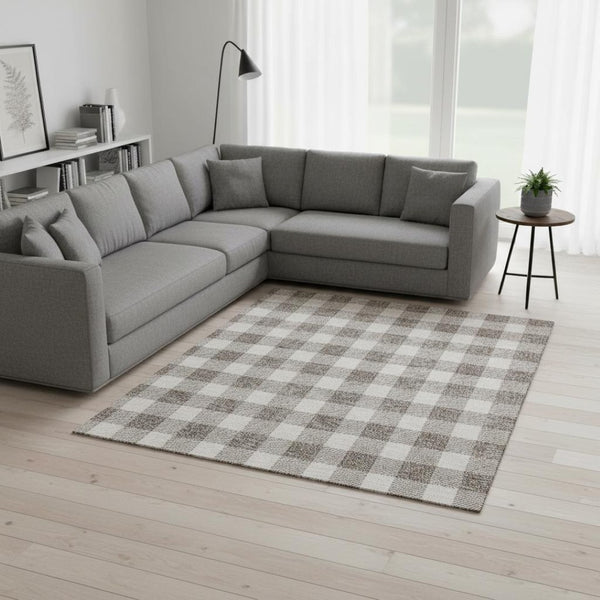 HomeRoots 10' X 14' Taupe and Ivory Plaid Area Rug - Durable, Washable, UV-Protected for Homes with Kids & Pets 673423