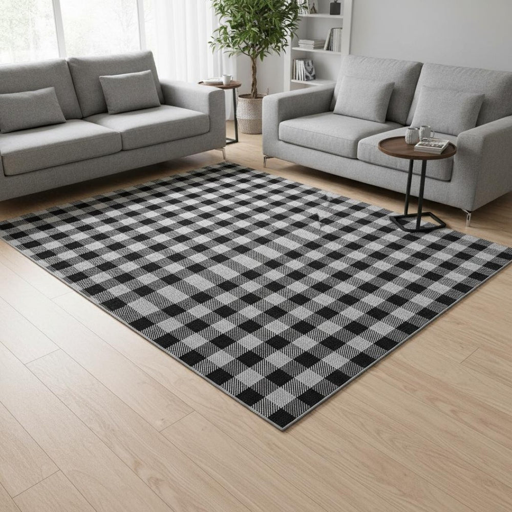 HomeRoots 8' X 10' Stylish Black and Ivory Plaid Washable Area Rug with UV Protection for High-Traffic Spaces 673445
