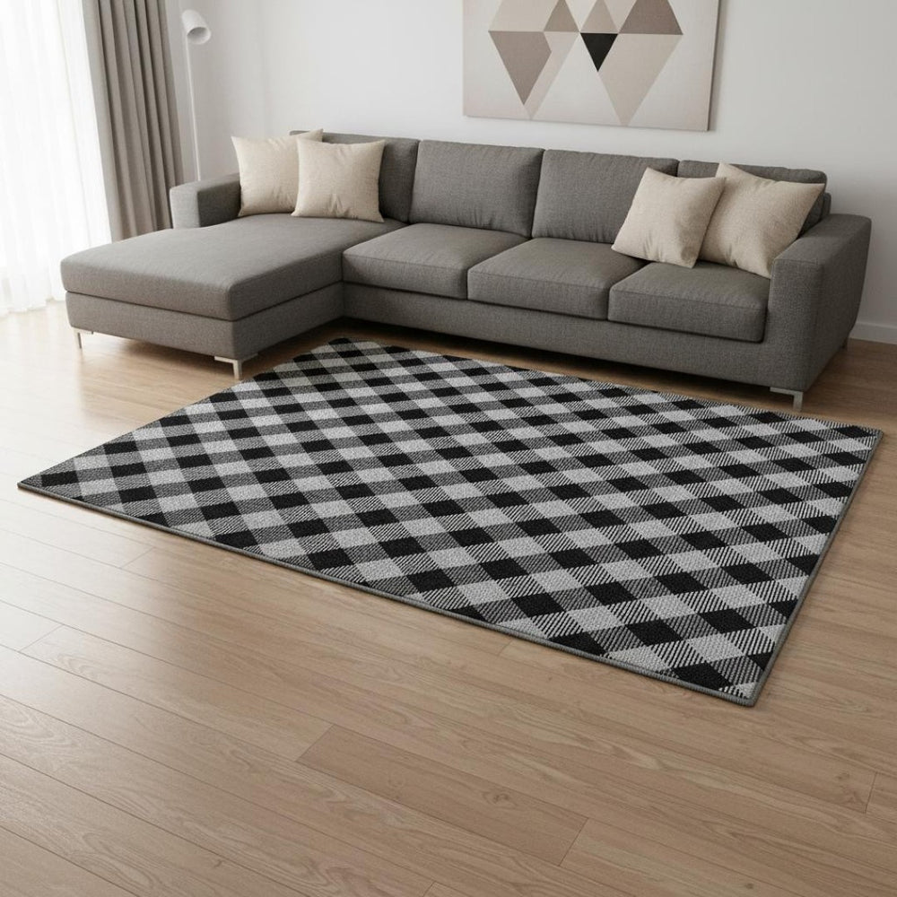 HomeRoots 10' X 14' Black And Ivory Plaid Area Rug - Washable, Stain Resistant, UV Protected for Family Spaces 673447