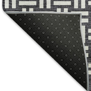 HomeRoots 8' Black And Ivory Abstract Geometric Round Rug – Washable, Stain-Resistant, UV Protected for Durability 673504