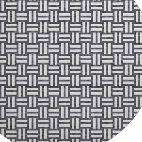 HomeRoots 8' Black And Ivory Abstract Geometric Round Rug – Washable, Stain-Resistant, UV Protected for Durability 673504
