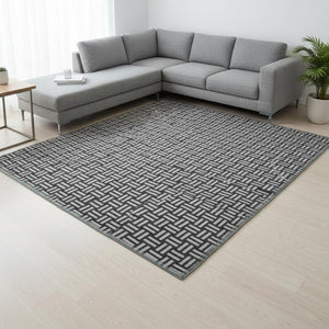 HomeRoots 9' X 12' Washable Black and Ivory Abstract Geometric Area Rug with UV Protection for Busy Homes 673506