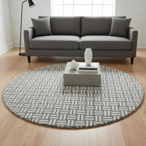 HomeRoots 8' Gray and Ivory Abstract Geometric Washable Round Rug - Stylish, Durable, UV-Protected Design! 673534