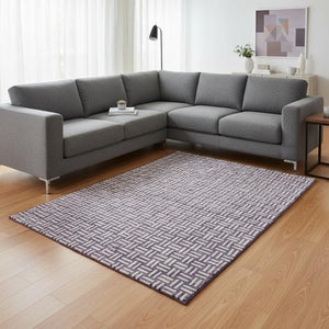 HomeRoots 9' X 12' Purple and Ivory Abstract Geometric Washable Area Rug – Durable, UV Protected & Stylish! 673572