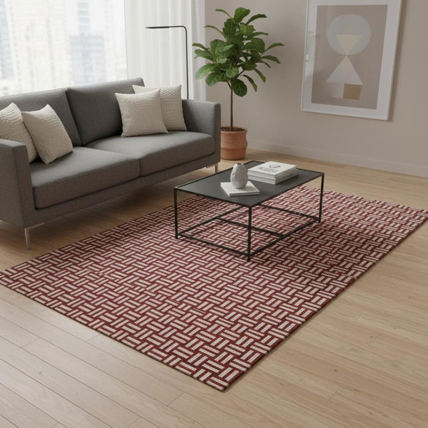 HomeRoots 5' X 8' Abstract Geometric Red and Ivory Washable Area Rug with UV Protection for Easy Care 673575