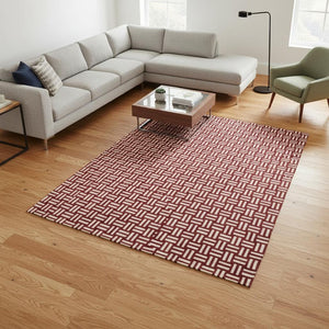 HomeRoots 10' Red and Ivory Abstract Geometric Area Rug - Washable, UV Protected, Perfect for Active Homes 673579
