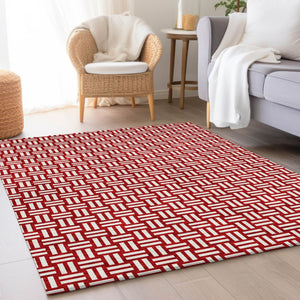 HomeRoots 10' Red and Ivory Abstract Geometric Area Rug - Washable, UV Protected, Perfect for Active Homes 673579