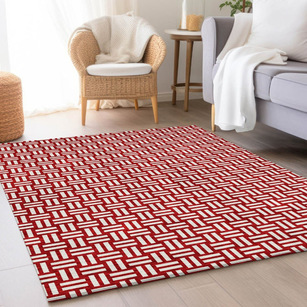 HomeRoots 10' Red and Ivory Abstract Geometric Area Rug - Washable, UV Protected, Perfect for Active Homes 673579