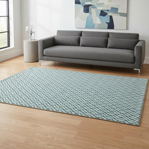 HomeRoots 5' X 8' Teal and Ivory Abstract Geometric Area Rug - Washable, UV Protected, Durable, Stylish Design 673587
