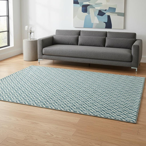 HomeRoots 5' X 8' Teal and Ivory Abstract Geometric Area Rug - Washable, UV Protected, Durable, Stylish Design 673587