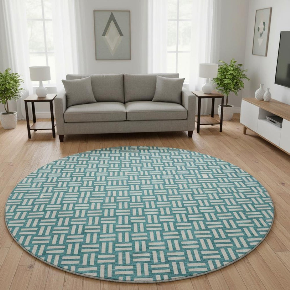 HomeRoots 8' Teal and Ivory Abstract Geometric Round Rug - Washable, UV Protected, Perfect for High Traffic Spaces 673588