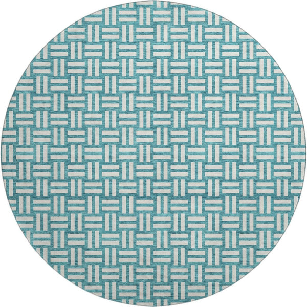 HomeRoots 8' Teal and Ivory Abstract Geometric Round Rug - Washable, UV Protected, Perfect for High Traffic Spaces 673588