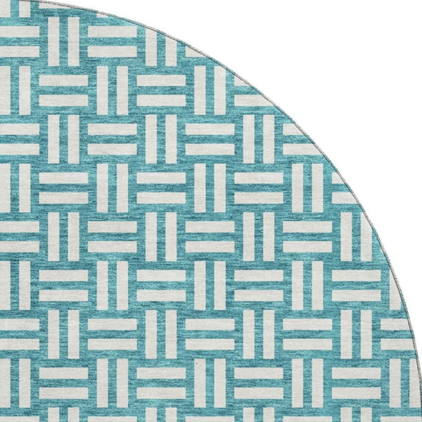 HomeRoots 8' Teal and Ivory Abstract Geometric Round Rug - Washable, UV Protected, Perfect for High Traffic Spaces 673588