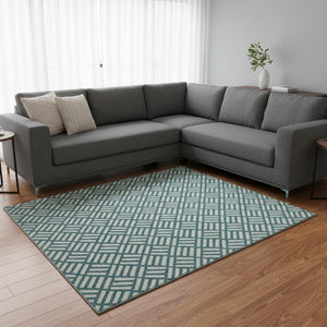 HomeRoots 8' X 10' Teal and Ivory Geometric Washable Area Rug with UV Protection for Stylish Everyday Living 673589