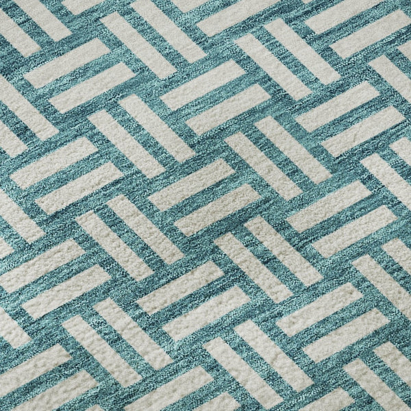 HomeRoots 9' X 12' Teal & Ivory Abstract Geometric Washable Area Rug with UV Protection for Modern Homes 673590