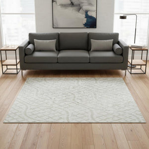 HomeRoots 5' X 8' Ivory And Beige Geometric Area Rug - Washable, Stain Resistant, UV Protected for All Spaces 673635